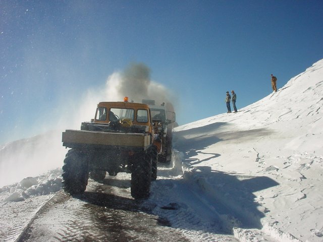 Jay helps push into the hard snow.