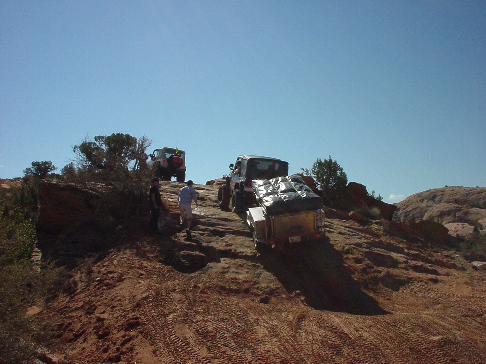 Jeep with trailer.