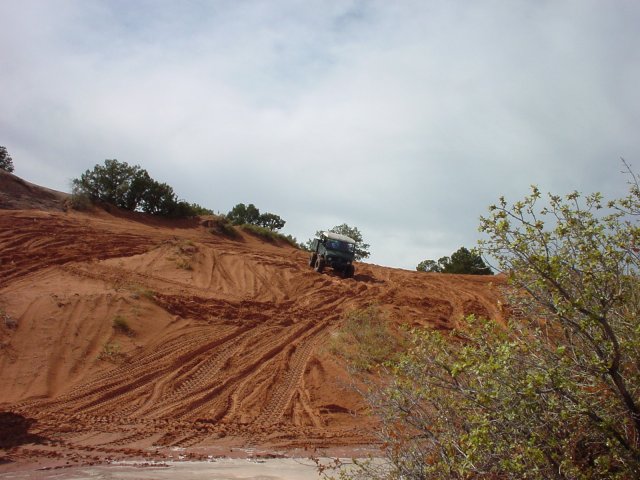 Greg's Mog on the sand hill.