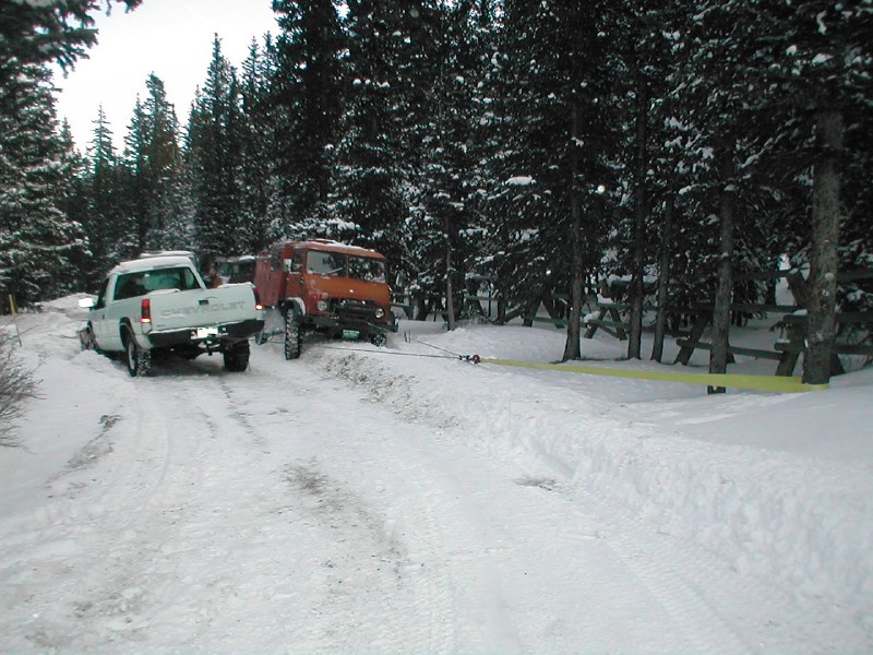 Towing the plow truck.
