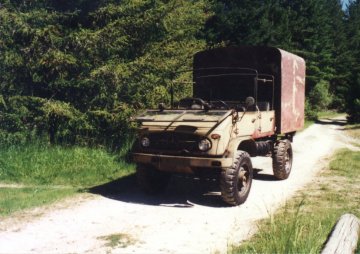 1963 404.1 crewcab with 6x6x6 garden shed on the back.